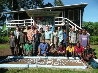 Swire Station visited by Merlin Swire with the community leader Filip Damen (centre), together with Wanang villagers, Binatang Center staff and visiting researchers